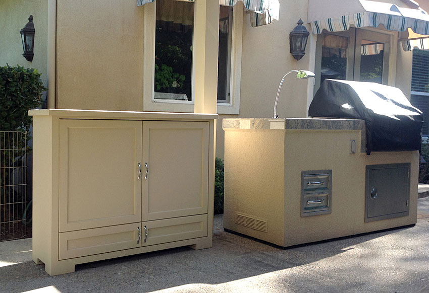 Outdoor wood TV lift to compliment BBQ details