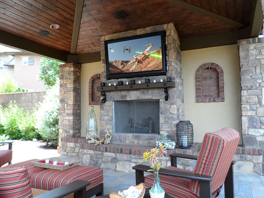 Outdoor TV in patio cover, sunbrite, mounted to stone