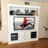 Custom White Built-In Wall Unit organized a complete home theater system