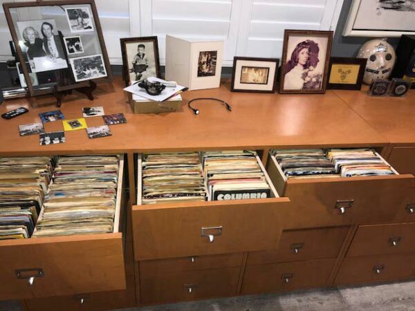 Open view of 12 drawer media cabinet for 45 records.