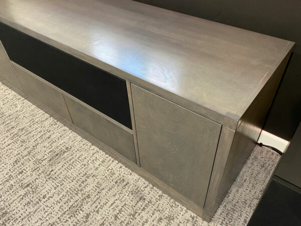 This gray credenza was built in birch wood, here you can see the beautiful grain pattern and simple and clean lines of this modern style