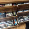 Open view of DVD storage drawers, houses box sets, and other sizes of media.