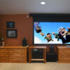 Matching media cabinets under motorized movie screen