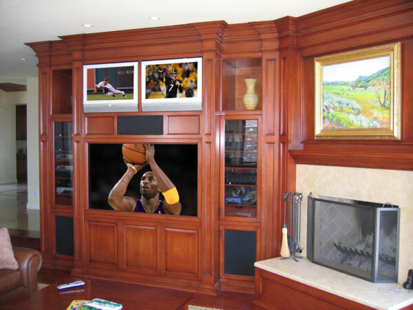 Floor to ceiling built-in home theater wall unit