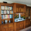 The new decorative columns provided the additional space needed to install a flat panel TV without interfering with the bookcase or display cabinet.