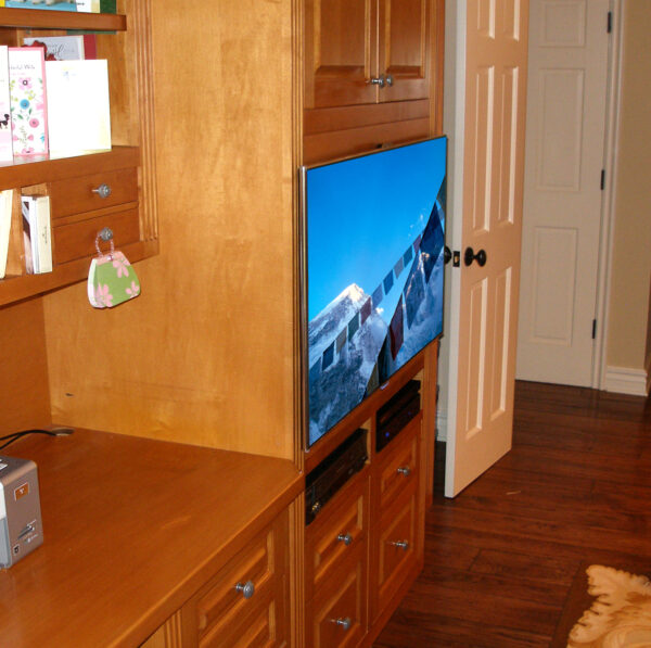 With this angled view you can see the TV was so skinny it looked great resting on top of the face frame of the furniture.