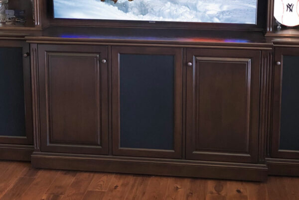 The credenza organzied a complete audio/video system, center speaker, and subwoofer.