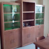 Here we can see green LED lights behind the frameless clear glass swith doors of the CWU-4 wall unit.