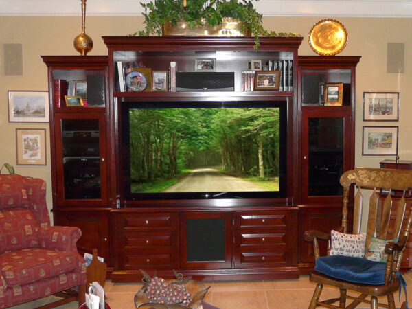 The perfect combination of a home theater entertainment center and media storage drawer cabinet