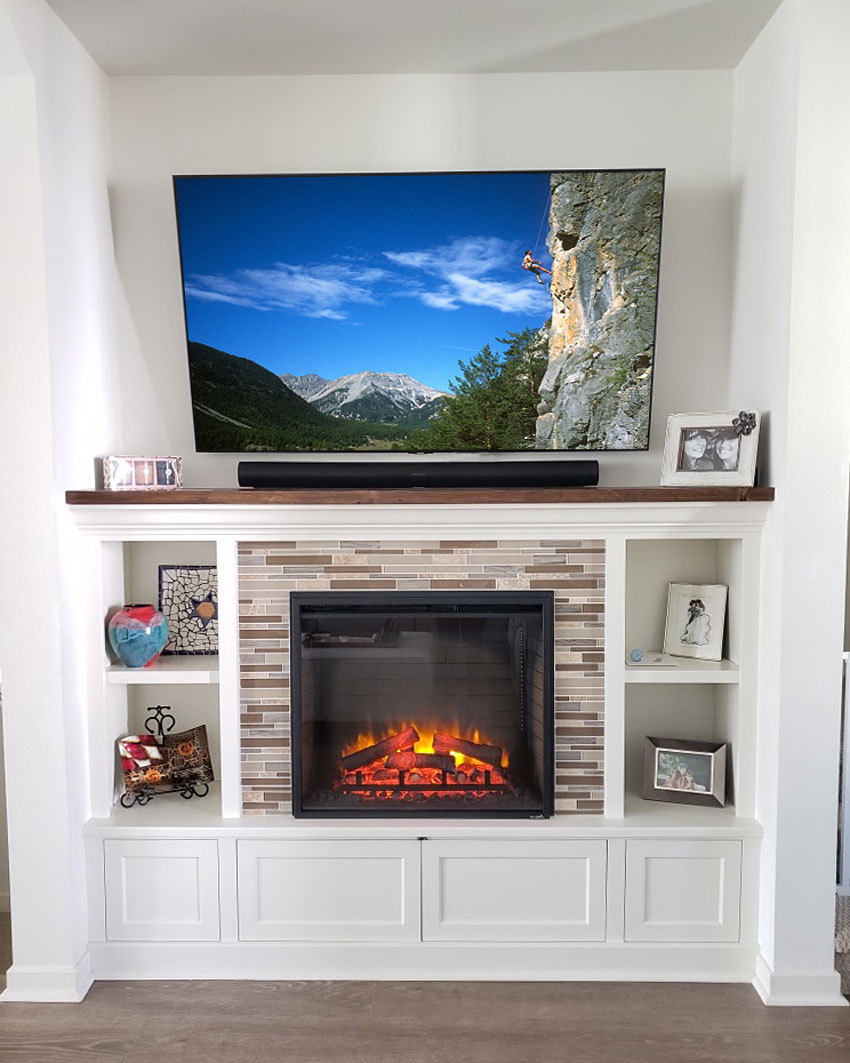 Built-In Custom Cabinetry, Sonos Arc sound bar, and Electric Fireplace.