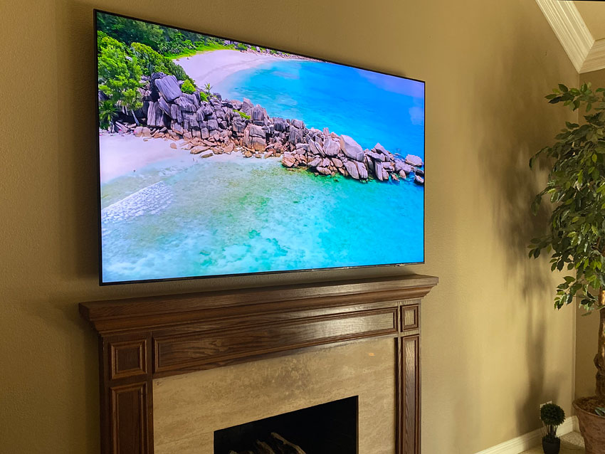 Wall Mounted Samsung 85" Ultra HD 4K TV Above Fireplace