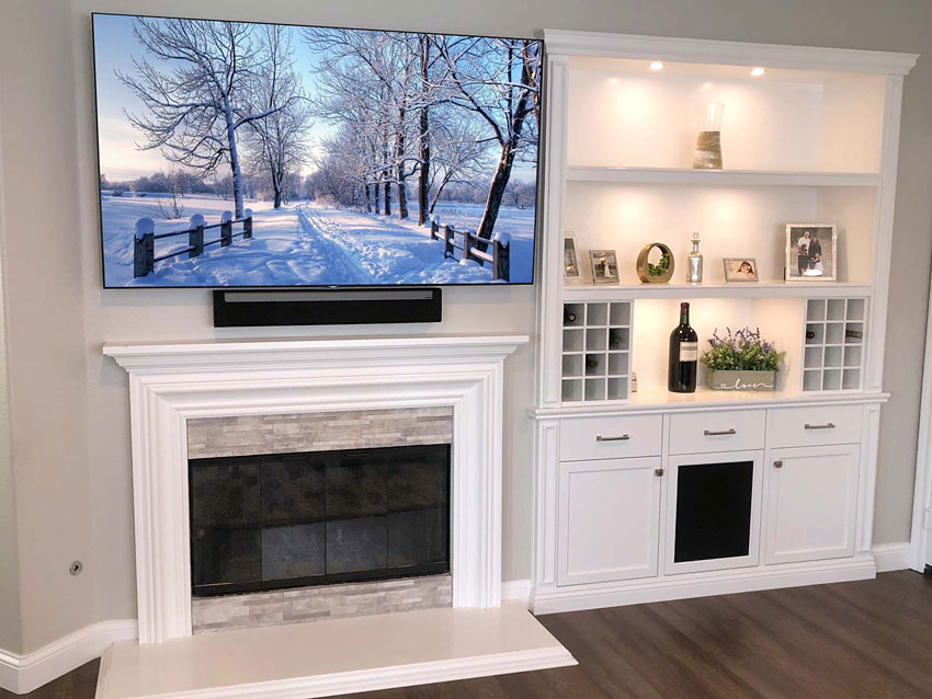 Wall Mount Flat Panel Above Fireplace with Sonos Soundbar