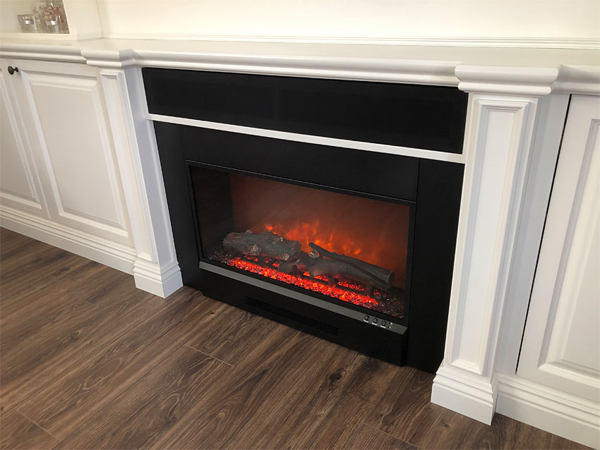 Closeup of Electric Fireplace and speaker cloth panel for sound bar