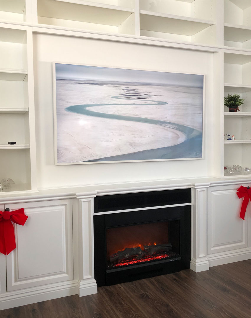 Closeup of the Samsung Frame (Artwork) TV and Electric Fireplace